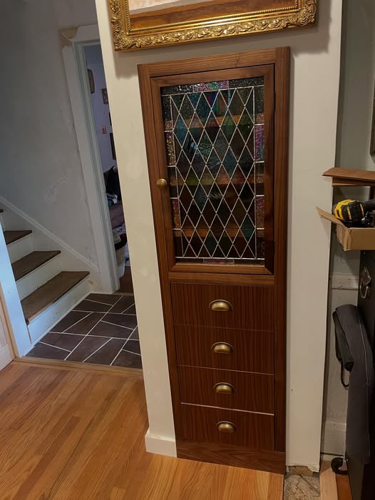 Storage built-in with stained glass panel